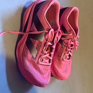 New Balance FuelCell Rebel v4
Women's Pink and Black Athletic Shoes